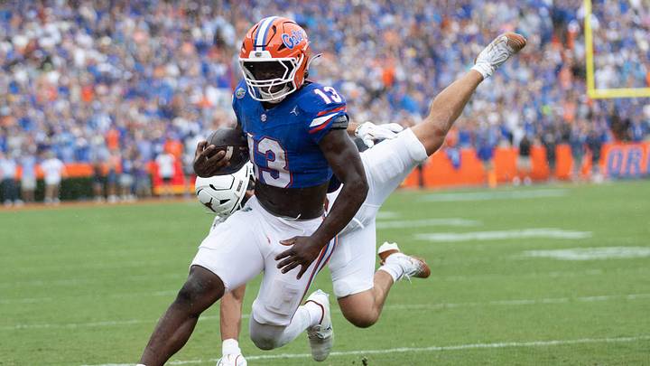 Florida running back Jadan Baugh (13) scores during the first half an NCAA football game in Gainesville, FL on Saturday, October 4, 2025. [Alan Youngblood/Gainesville Sun]