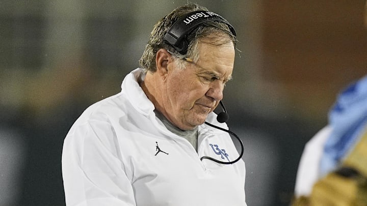 Sep 6, 2025; Charlotte, North Carolina, USA; North Carolina Tar Heels head coach Bill Belichic looks at his iPad during the second half against the Charlotte 49ers at Jerry Richardson Stadium. Sep 6, 2025; Charlotte, North Carolina, USA; North Carolina Tar Heels head coach Bill Belichic looks at his iPad during the second half against the Charlotte 49ers at Jerry Richardson Stadium.