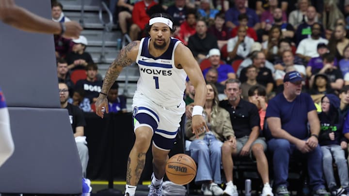 Oct 11, 2024; Des Moines, Iowa, USA; Minnesota Timberwolves guard Daishen Nix (1) brings the ball up the court against the Philadelphia 76ers at Wells Fargo Arena. The Timberwolves beat the 76ers 121 to 111.  Mandatory Credit: Reese Strickland-Imagn Images