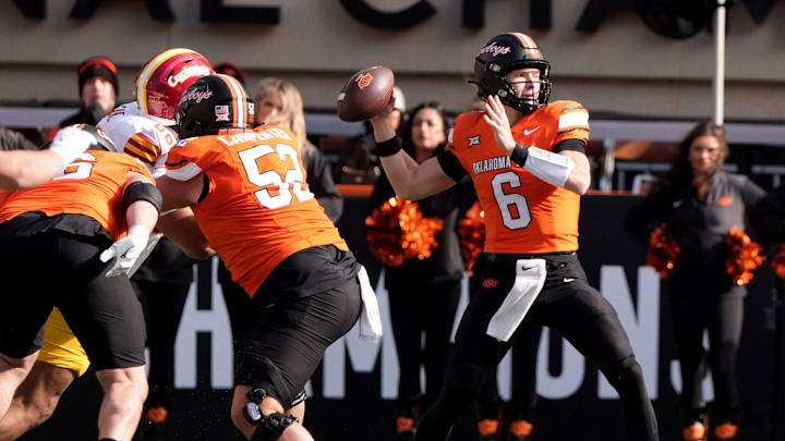 Oklahoma State's Zane Flores (6) looks to throw a pass in the first half of the college football game between the Oklahoma State Cowboys and the Iowa State Cyclones at Boone Pickens Stadium in Stillwater, Okla., Saturday Nov. 29, 2025. Oklahoma State's Zane Flores (6) looks to throw a pass in the first half of the college football game between the Oklahoma State Cowboys and the Iowa State Cyclones at Boone Pickens Stadium in Stillwater, Okla., Saturday Nov. 29, 2025.
