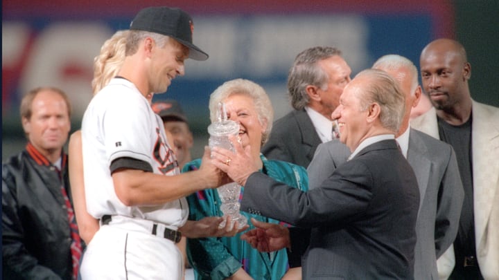Peter Angelos presenting Cal Ripken Jr. with an award during the California Angels v Baltimore Orioles game