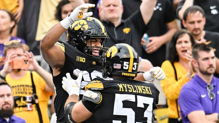 Sep 19, 2026; Iowa City, Iowa, USA; Iowa Hawkeyes running back Xavier Williams (26) reacts with offensive lineman Michael Myslinski (53) after scoring a touchdown against the UNI Panthers during the third quarter at Kinnick Stadium. Mandatory Credit: Jeffrey Becker-Imagn Images Sep 19, 2026; Iowa City, Iowa, USA; Iowa Hawkeyes running back Xavier Williams (26) reacts with offensive lineman Michael Myslinski (53) after scoring a touchdown against the UNI Panthers during the third quarter at Kinnick Stadium. Mandatory Credit: Jeffrey Becker-Imagn Images