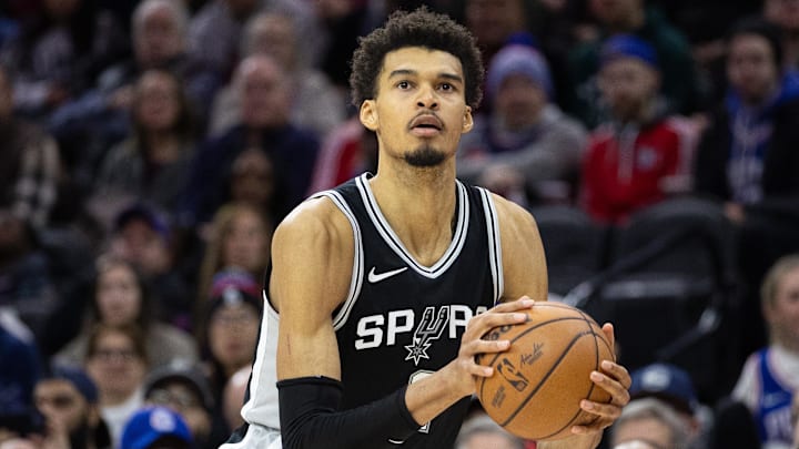 Dec 23, 2024; Philadelphia, Pennsylvania, USA; San Antonio Spurs center Victor Wembanyama (1) shoots the ball against the Philadelphia 76ers during the fourth quarter at Wells Fargo Center.