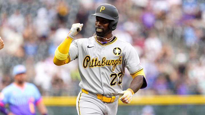 Aug 1, 2025; Denver, Colorado, USA; Pittsburgh Pirates designated hitter Andrew McCutchen (22) runs off a three run home run in the first inning against the Colorado Rockies at Coors Field. Mandatory Credit: Ron Chenoy-Imagn Images