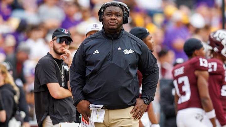 Nov 25, 2023; Baton Rouge, Louisiana, USA;  Texas A&M Aggies interim head coach Elijah Robinson looks on against the LSU Tigers during the second half at Tiger Stadium. Mandatory Credit: Stephen Lew-Imagn Images