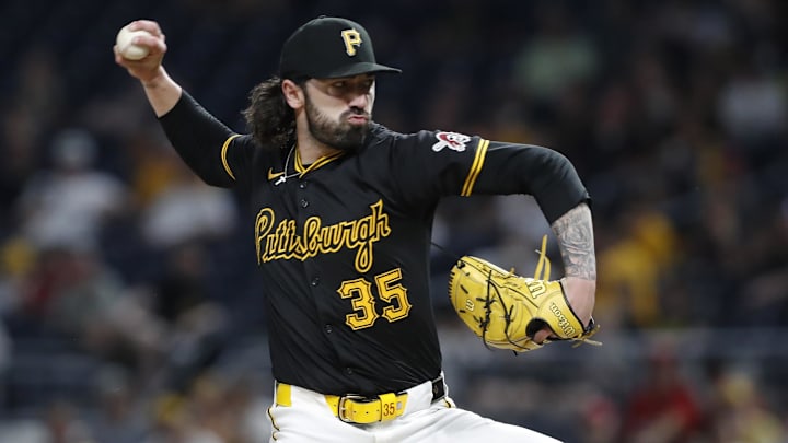 Jun 17, 2024; Pittsburgh, Pennsylvania, USA; Pittsburgh Pirates relief pitcher Colin Holderman (35) pitches against the Cincinnati Reds during the eighth inning at PNC Park. The Pirates won 4-1. Mandatory Credit: Charles LeClaire-Imagn Images Jun 17, 2024; Pittsburgh, Pennsylvania, USA; Pittsburgh Pirates relief pitcher Colin Holderman (35) pitches against the Cincinnati Reds during the eighth inning at PNC Park. The Pirates won 4-1. Mandatory Credit: Charles LeClaire-Imagn Images