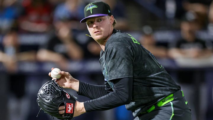 Jul 22, 2025; Tampa, Florida, USA; Tampa Bay Rays pitcher Pete Fairbanks (29) throws to first for an out against the Chicago White Sox in the ninth inning at George M. Steinbrenner Field.