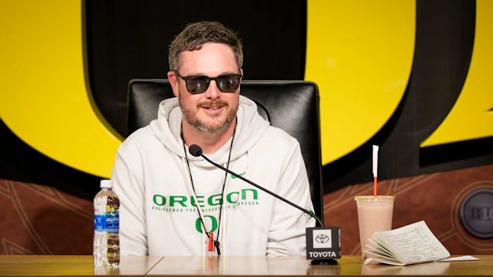 Oregon head coach Dan Lanning speaks from the podium at the Hatfield-Dowlin Complex on the first day of spring practice for the Oregon Ducks on March 12, 2026, in Eugene, Oregon.