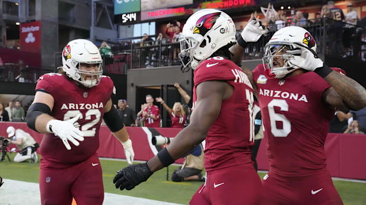 Arizona Cardinals wide receiver Marvin Harrison Jr. (18) celebrates his touchdown catch with center Evan Brown (62) and running back James Conner (6) against the New York Jets during the second quarter at State Farm Stadium in Glendale on Nov. 10, 2024.