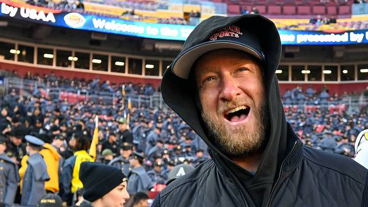 Dec 14, 2024; Landover, Maryland, USA;   Dave Portnoy, Bar Stool Sports  founder and owner  walks along the sidelines before the playing of the 125 Army Navy game at Commanders Field. Mandatory Credit: Tommy Gilligan-Imagn ImagesDec 14, 2024; Landover, Maryland, USA;  Dave Portnoy poses with solders before the between the Army Black Knights and the Navy Midshipmen  at Commanders Field. Mandatory Credit: Tommy Gilligan-Imagn Images