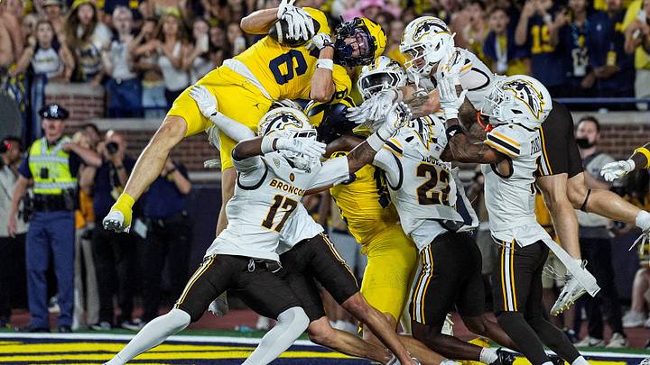 Michigan wide receiver JJ Buchanan catches for a touchdown against Western Michigan to win the game 13-12 as time expires