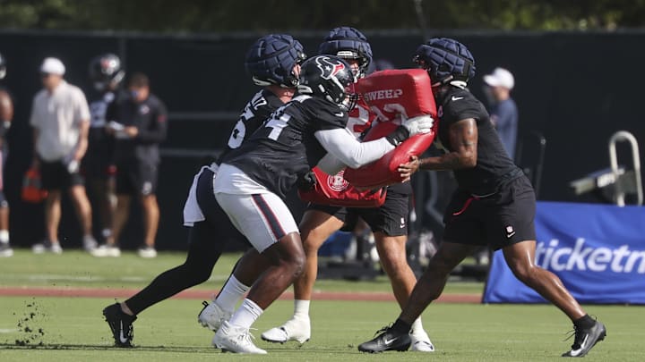 Jul 24, 2025; Houston, TX, USA; Houston Texans tight end Dalton Schultz (86) and tackle Cam Robinson (74) and tight end Brevin Jordan (9) during training camp at Houston Methodist Training Center. Mandatory Credit: Troy Taormina-Imagn Images