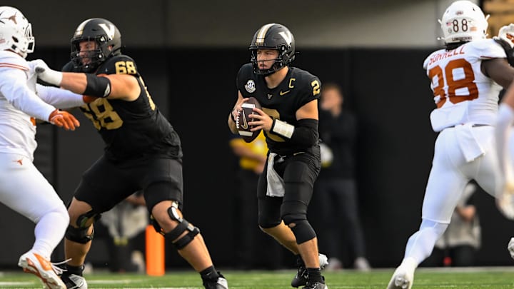 Oct 26, 2024; Nashville, Tennessee, USA; Vanderbilt Commodores quarterback Diego Pavia (2) scrambles against the Texas Longhorns during the first half at FirstBank Stadium. Mandatory Credit: Steve Roberts-Imagn Images Oct 26, 2024; Nashville, Tennessee, USA; Vanderbilt Commodores quarterback Diego Pavia (2) scrambles against the Texas Longhorns during the first half at FirstBank Stadium. Mandatory Credit: Steve Roberts-Imagn Images