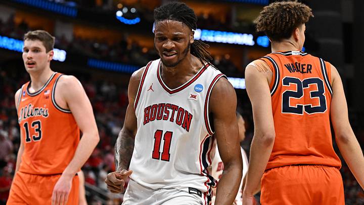 Houston Cougars forward Joseph Tugler (11) reacts in the first half during a Sweet Sixteen game of the South Regional of the men's 2026 NCAA Tournament at Toyota Center. 
