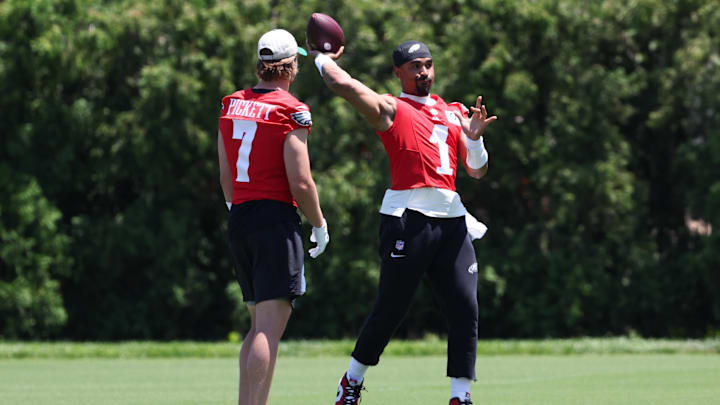 Philadelphia Eagles quarterback Jalen Hurts throws the ball in front of quarterback Kenny Pickett. Philadelphia Eagles quarterback Jalen Hurts throws the ball in front of quarterback Kenny Pickett.