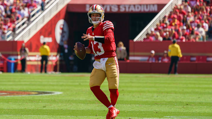 Sep 29, 2024; Santa Clara, California, USA; San Francisco 49ers quarterback Brock Purdy (13) prepares to pass the football against the New England Patriots during the first quarter at Levi's Stadium. Mandatory Credit: Neville E. Guard-Imagn Images