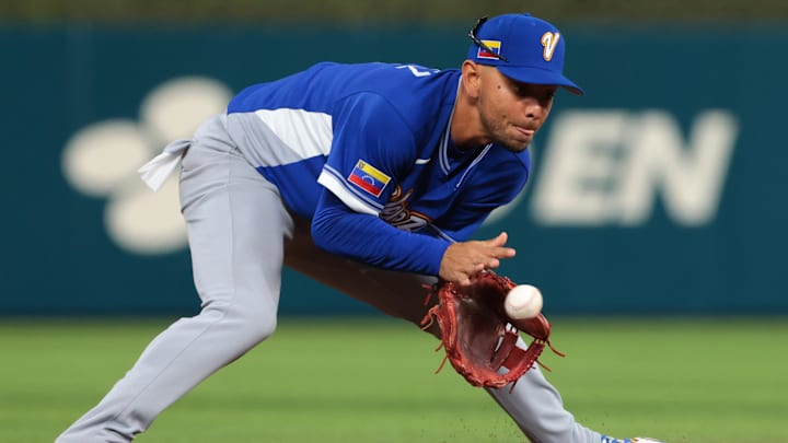 Mar 9, 2026; Miami, FL, United States; Venezuela shortstop Andres Gimenez (0) catches a ground ball to retire Nicaragua right fielder Cristhian Sandoval (not pictured) during the seventh inning at loanDepot Park.