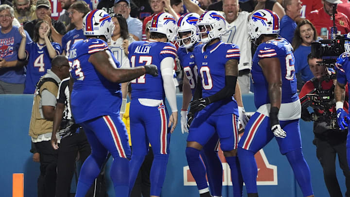 Sep 18, 2025; Orchard Park, New York, USA;  Buffalo Bills tight end Dalton Kincaid (86) celebrates with quarterback Josh Allen (17) after scoring a touchdown against the Miami Dolphins