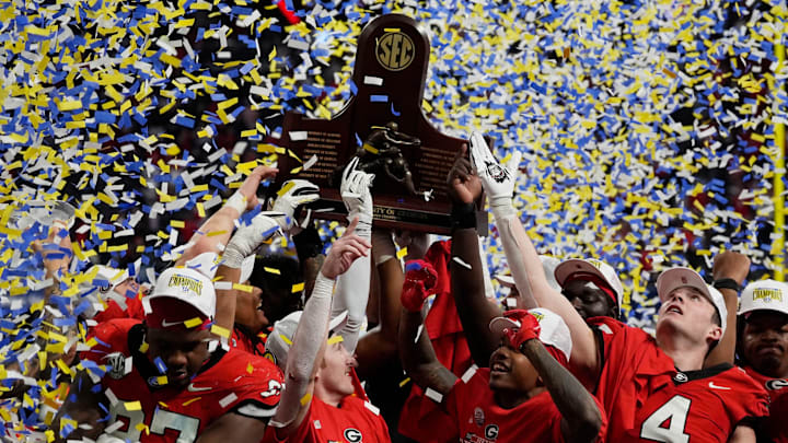 Georgia celebrates after the winning the SEC championship game against Texas in Atlanta, on Saturday, Dec. 7, 2024. Georgia won 22-19.