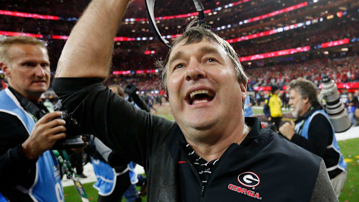 Georgia coach Kirby Smart celebrates with fans after the NCAA College Football National Championship Georgia coach Kirby Smart celebrates with fans after the NCAA College Football National Championship