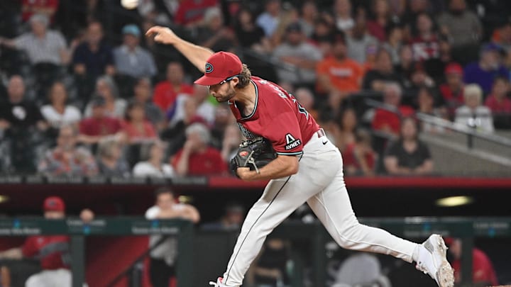 Jul 1, 2025; Phoenix, Arizona, USA; Arizona Diamondbacks pitcher Zac Gallen (23) throws in the seventh inning against the San Francisco Giants  at Chase Field. Mandatory Credit: Matt Kartozian-Imagn Images