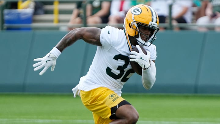 Green Bay Packers running back MarShawn Lloyd (32) runs through a drill during the second day of training camp on Thursday, July 24, 2025, at Ray Nitschke Field in Ashwaubenon, Wis. Green Bay Packers running back MarShawn Lloyd (32) runs through a drill during the second day of training camp on Thursday, July 24, 2025, at Ray Nitschke Field in Ashwaubenon, Wis.