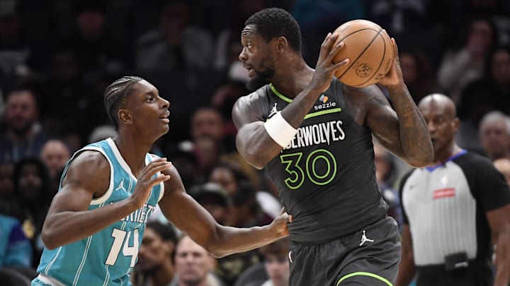 Minnesota Timberwolves forward Julius Randle controls the ball as Charlotte Hornets forward Moussa Diabate defends during the first half at the Spectrum Center in Charlotte, N.C., on March 5, 2025. Minnesota Timberwolves forward Julius Randle controls the ball as Charlotte Hornets forward Moussa Diabate defends during the first half at the Spectrum Center in Charlotte, N.C., on March 5, 2025.