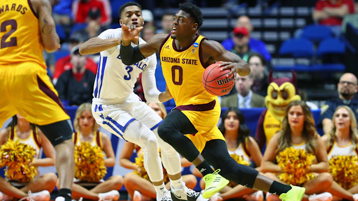 Mar 22, 2019; Tulsa, OK, USA; Arizona State Sun Devils guard Luguentz Dort (0) dribbles past Buffalo Bulls guard Jayvon Graves (3) during the second half in the first round of the 2019 NCAA Tournament at BOK Center. Mandatory Credit: Mark J. Rebilas-Imagn Images