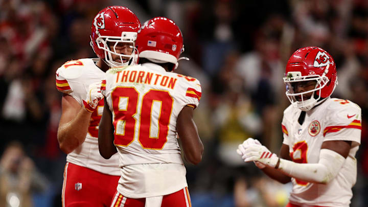 [US, Mexico & Canada customers only] Sep 5, 2025; Sao Paulo, BRAZIL; Kansas City Chiefs tight end Travis Kelce (87) celebrates with teammates after scoring a touchdown against the Los Angeles Chargers in the second half during a NFL game at Corinthians Arena. Mandatory Credit: Jean Carniel/Reuters via Imagn Images