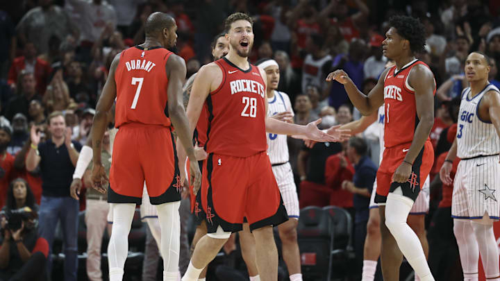Nov 16, 2025; Houston, Texas, USA; Houston Rockets center Alperen Sengun (28) reacts after making a basket during overtime against the Orlando Magic at Toyota Center. Mandatory Credit: Troy Taormina-Imagn Images