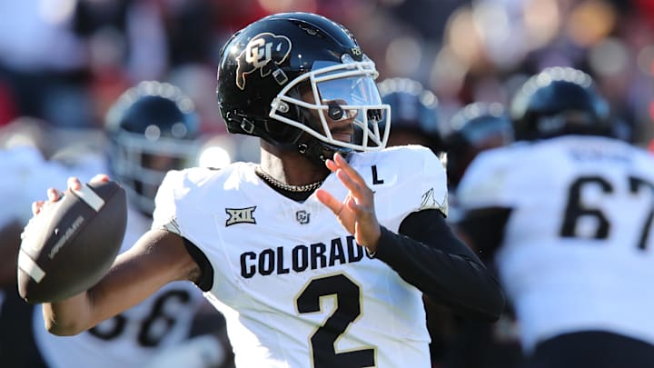 Nov 9, 2024; Lubbock, Texas, USA; Colorado Buffalos quarterback Shedeur Sanders (2) passes against the Texas Tech Red Raiders in the first half at Jones AT&T Stadium and Cody Campbell Field. Mandatory Credit: Michael C. Johnson-Imagn Images