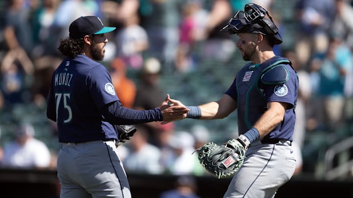 May 7, 2025; West Sacramento, California, USA; Seattle Mariners pitcher Andrés Muñoz (75) and catcher Cal Raleigh (29) celebrate their 6-5 victory over the Athletics at Sutter Health Park. Mandatory Credit: D. Ross Cameron-Imagn Images May 7, 2025; West Sacramento, California, USA; Seattle Mariners pitcher Andrés Muñoz (75) and catcher Cal Raleigh (29) celebrate their 6-5 victory over the Athletics at Sutter Health Park. Mandatory Credit: D. Ross Cameron-Imagn Images