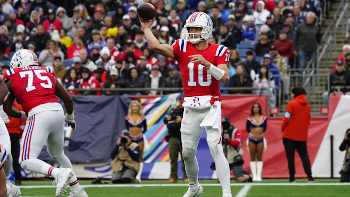Oct 13, 2024; Foxborough, Massachusetts, USA; New England Patriots quarterback Drake Maye (10) throws the ball against the Houston Texans during the second half at Gillette Stadium. Mandatory Credit: Gregory Fisher-Imagn Images