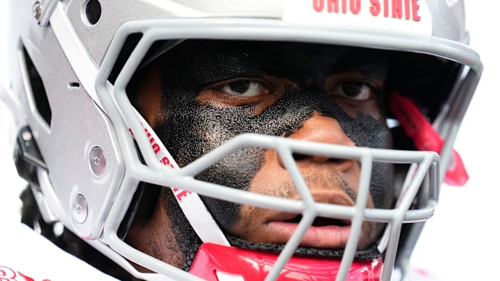 Ohio State Buckeyes offensive lineman Phillip Daniels (70) walks off the field after warm ups prior to the NCAA football game against the Washington Huskies at Husky Stadium in Seattle on Sept. 27, 2025.
