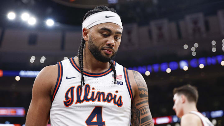 Nov 19, 2025; Chicago, Illinois, USA; Illinois Fighting Illini guard Kylan Boswell (4) reacts during the first half at United Center. Mandatory Credit: Kamil Krzaczynski-Imagn Images
