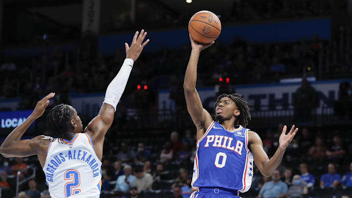 Oct 24, 2021; Oklahoma City, Oklahoma, USA; Philadelphia 76ers guard Tyrese Maxey (0) shoots as Oklahoma City Thunder guard Shai Gilgeous-Alexander (2) defends during the first quarter at Paycom Center. Mandatory Credit: Alonzo Adams-Imagn Images Oct 24, 2021; Oklahoma City, Oklahoma, USA; Philadelphia 76ers guard Tyrese Maxey (0) shoots as Oklahoma City Thunder guard Shai Gilgeous-Alexander (2) defends during the first quarter at Paycom Center. Mandatory Credit: Alonzo Adams-Imagn Images