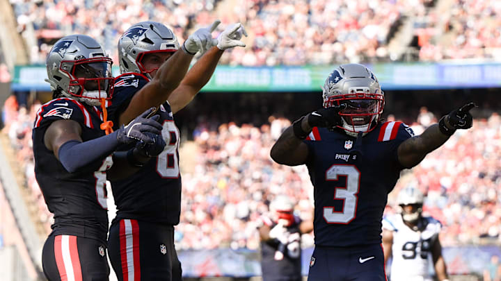 New England Patriots wide receiver Stefon Diggs, left, tight end Hunter Henry, middle, and wide receiver Demario Douglas
