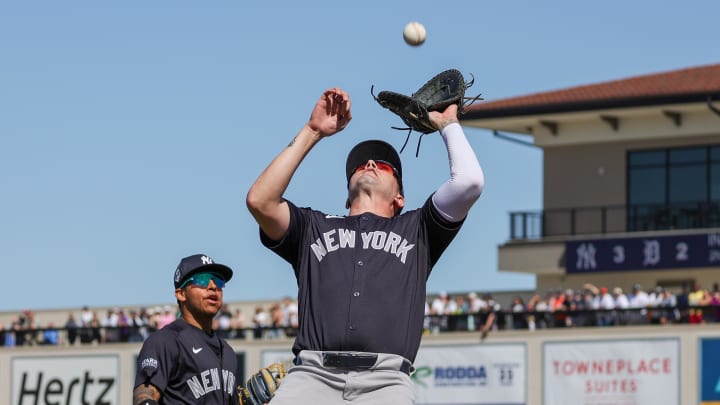 Feb 24, 2024; Lakeland, Florida, USA; New York Yankees first baseman Jordan Groshans (84) catches a fly ball during the second inning against the Detroit Tigers at Publix Field at Joker Marchant Stadium. Mandatory Credit: Mike Watters-USA TODAY Sports