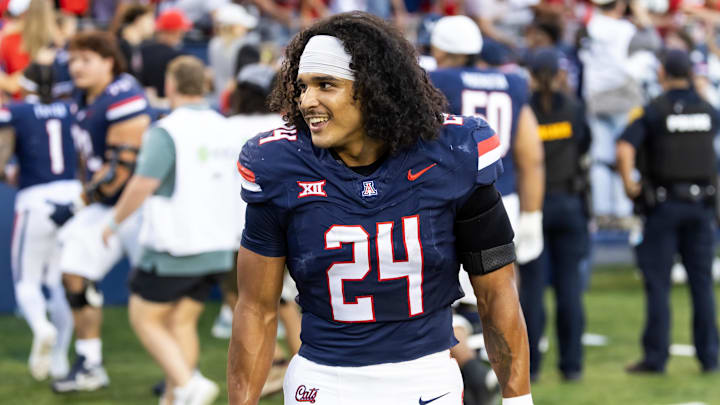 Nov 8, 2025; Tucson, Arizona, USA; Arizona Wildcats running back Quincy Craig (24) against the Kansas Jayhawks at Arizona Stadium. Mandatory Credit: Mark J. Rebilas-Imagn Images
