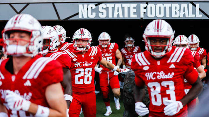 Aug 28, 2025; Raleigh, North Carolina, USA; North Carolina State Wolfpack wide receiver Sam Dodd (28) runs out during the warmups prior to the game against East Carolina Pirates at Carter-Finley Stadium. Mandatory Credit: Jaylynn Nash-Imagn Images Aug 28, 2025; Raleigh, North Carolina, USA; North Carolina State Wolfpack wide receiver Sam Dodd (28) runs out during the warmups prior to the game against East Carolina Pirates at Carter-Finley Stadium. Mandatory Credit: Jaylynn Nash-Imagn Images