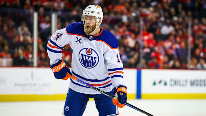 Feb 4, 2026; Calgary, Alberta, CAN; Edmonton Oilers defenseman Mattias Ekholm (14) against the Calgary Flames during the third period at Scotiabank Saddledome. Mandatory Credit: Sergei Belski-Imagn Images
