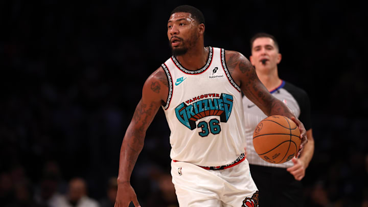 Nov 13, 2024; Los Angeles, California, USA: Memphis Grizzlies guard Marcus Smart (36) dribbles the ball during the third quarter against the Los Angeles Lakers at Crypto.com Arena. Mandatory Credit: Kiyoshi Mio-Imagn Images