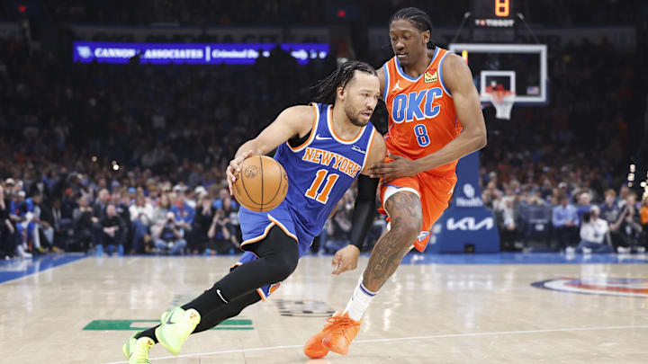 Jan 3, 2025; Oklahoma City, Oklahoma, USA; New York Knicks guard Jalen Brunson (11) drives around Oklahoma City Thunder forward Jalen Williams (8) during the first quarter at Paycom Center. Mandatory Credit: Alonzo Adams-Imagn Images Jan 3, 2025; Oklahoma City, Oklahoma, USA; New York Knicks guard Jalen Brunson (11) drives around Oklahoma City Thunder forward Jalen Williams (8) during the first quarter at Paycom Center. Mandatory Credit: Alonzo Adams-Imagn Images