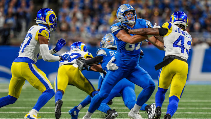 Detroit Lions tight end Sam LaPorta (87) blocks Los Angeles Rams safety John Johnson III (43) on a pass play to Detroit Lions wide receiver Jameson Williams (9) during the first half of the Detroit Lions season opener against the Los Angeles Rams at Ford Field in Detroit, on Sunday, Sept. 8. 2024.