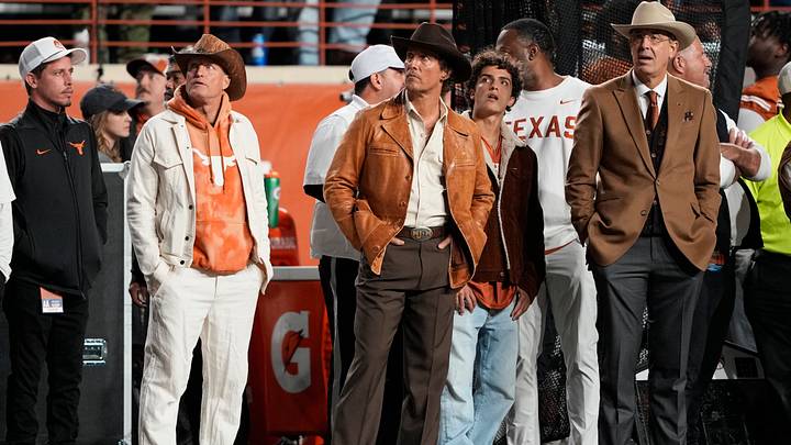 Nov 28, 2025; Austin, Texas, USA; Actors Woody Harrelson (left) and Matthew McConaughey (center) stand beside Texas Longhorns Athletic Director Chris Del Conte during the first half against the Texas A&M Aggies at Darrell K Royal-Texas Memorial Stadium. Mandatory Credit: Scott Wachter-Imagn Images Nov 28, 2025; Austin, Texas, USA; Actors Woody Harrelson (left) and Matthew McConaughey (center) stand beside Texas Longhorns Athletic Director Chris Del Conte during the first half against the Texas A&M Aggies at Darrell K Royal-Texas Memorial Stadium. Mandatory Credit: Scott Wachter-Imagn Images