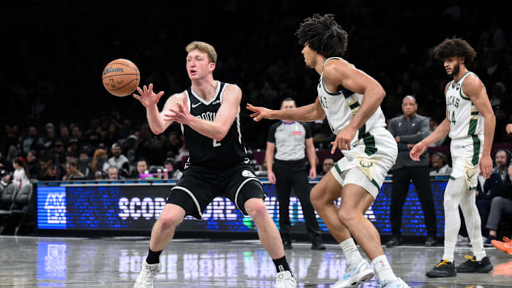 Dec 14, 2025; Brooklyn, New York, USA; Brooklyn Nets forward Danny Wolf (2) passes the ball as Milwaukee Bucks center Jericho Sims (00) defends during the second half at Barclays Center. Mandatory Credit: John Jones-Imagn Images Dec 14, 2025; Brooklyn, New York, USA; Brooklyn Nets forward Danny Wolf (2) passes the ball as Milwaukee Bucks center Jericho Sims (00) defends during the second half at Barclays Center. Mandatory Credit: John Jones-Imagn Images