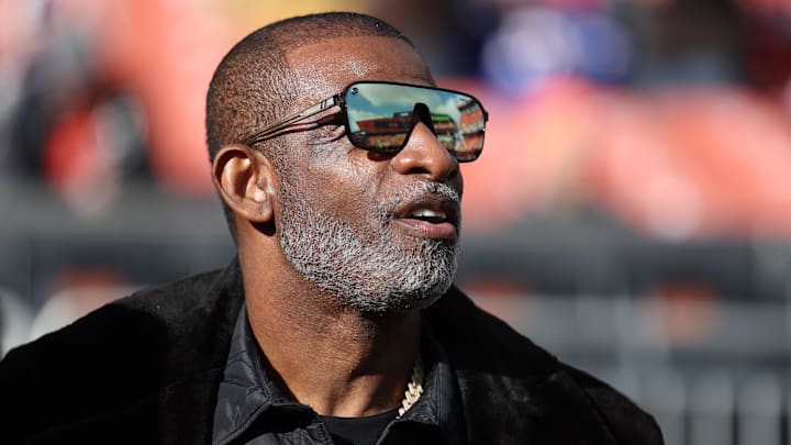 Dec 21, 2025; Cleveland, Ohio, USA;  Legendary  football and baseball player and father of Cleveland Browns quarterback Shedeur Sanders, Deion Sanders on the sidelines prior to a game against the Buffalo Bills at Huntington Bank Field. Mandatory Credit: Scott Galvin-Imagn Images