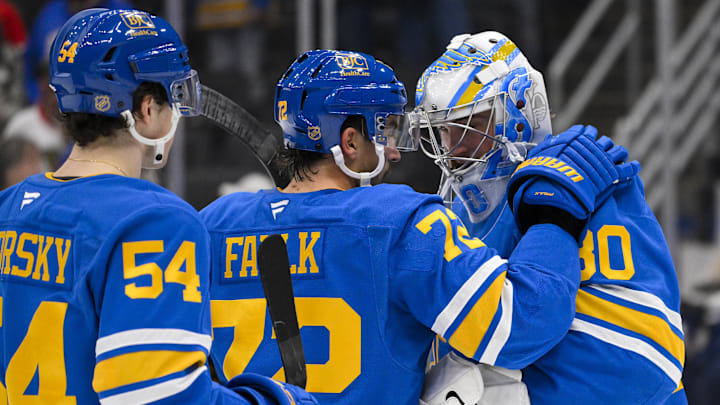 Dec 12, 2025; St. Louis, Missouri, USA; St. Louis Blues goaltender Joel Hofer (30) celebrates with defenseman Justin Faulk (72) after the Blues defeated the Chicago Blackhawks at Enterprise Center. Mandatory Credit: Jeff Curry-Imagn Images Dec 12, 2025; St. Louis, Missouri, USA; St. Louis Blues goaltender Joel Hofer (30) celebrates with defenseman Justin Faulk (72) after the Blues defeated the Chicago Blackhawks at Enterprise Center. Mandatory Credit: Jeff Curry-Imagn Images
