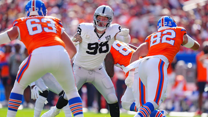 Oct 6, 2024; Denver, Colorado, USA; Las Vegas Raiders defensive end Maxx Crosby (98) during the second quarter against the Denver Broncos at Empower Field at Mile High. Mandatory Credit: Ron Chenoy-Imagn Images