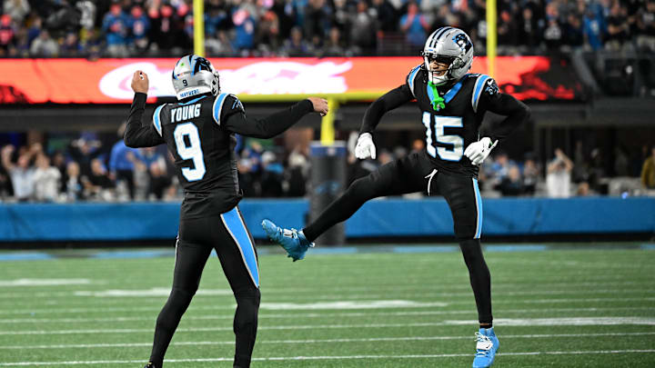 Jan 10, 2026; Charlotte, NC, USA; Carolina Panthers quarterback Bryce Young (9) and wide receiver Jimmy Horn Jr. (15) reacts in the fourth quarter in an NFC Wild Card Round game at Bank of America Stadium. Mandatory Credit: Bob Donnan-Imagn Images